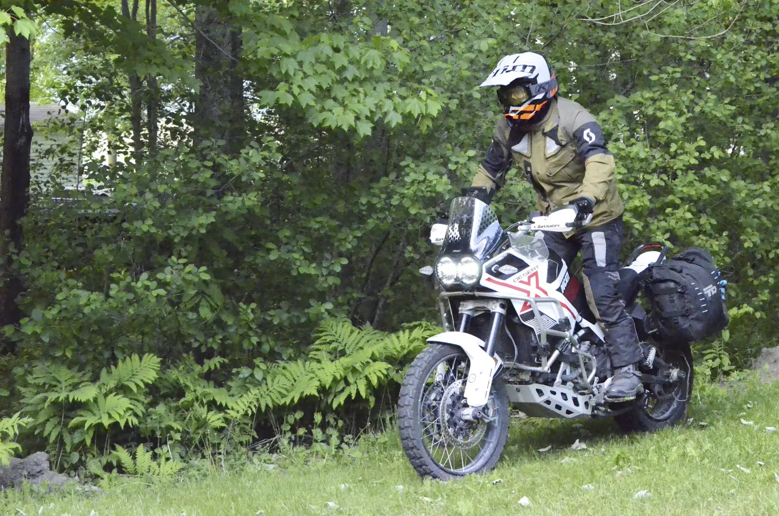 Traction footpegs mounted on the Ducati Desert X for a better riding position.